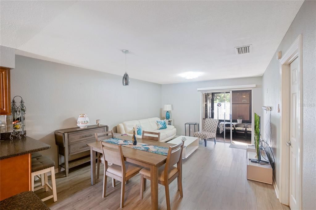 Dining and living room combo.Updated luxury vinyl flooring throughout entire home.