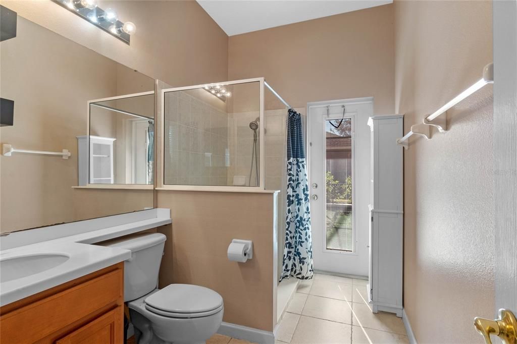 Bathroom 3 / In-law bath with access to the pool area.