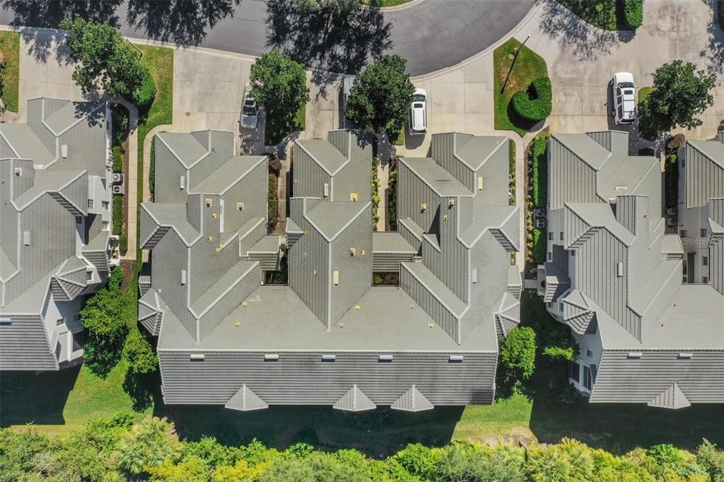 Tile roofs on all buildings in this community.