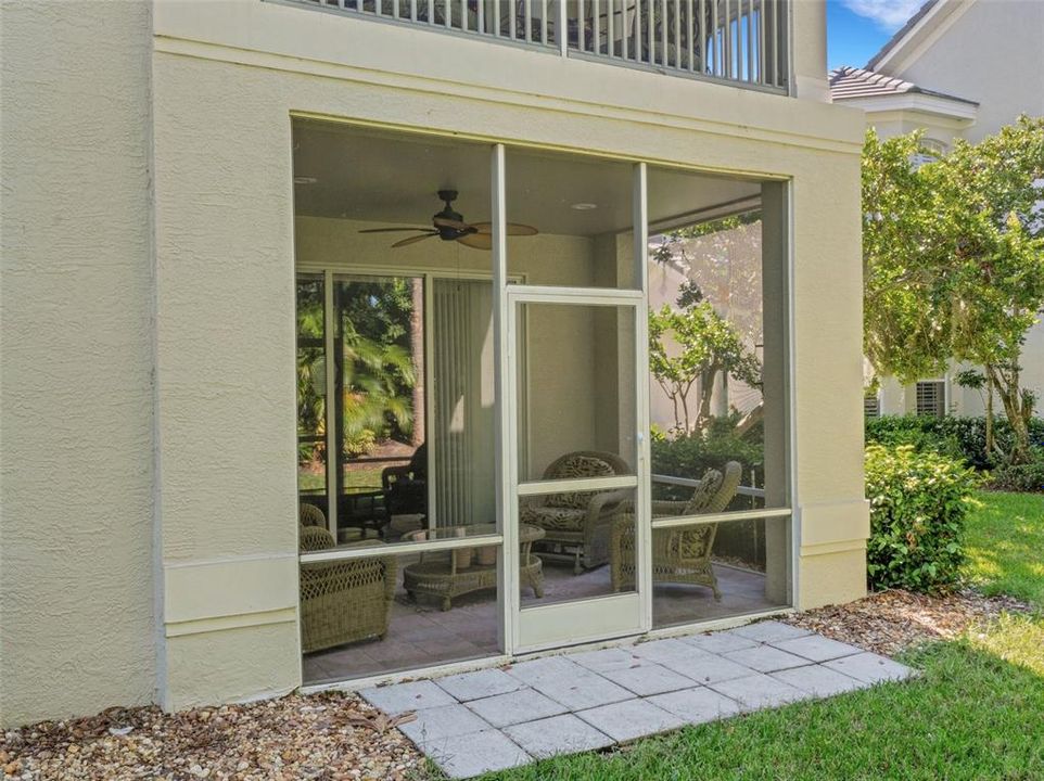 Stepping outside the lanai you will find small patio of concrete pavers.