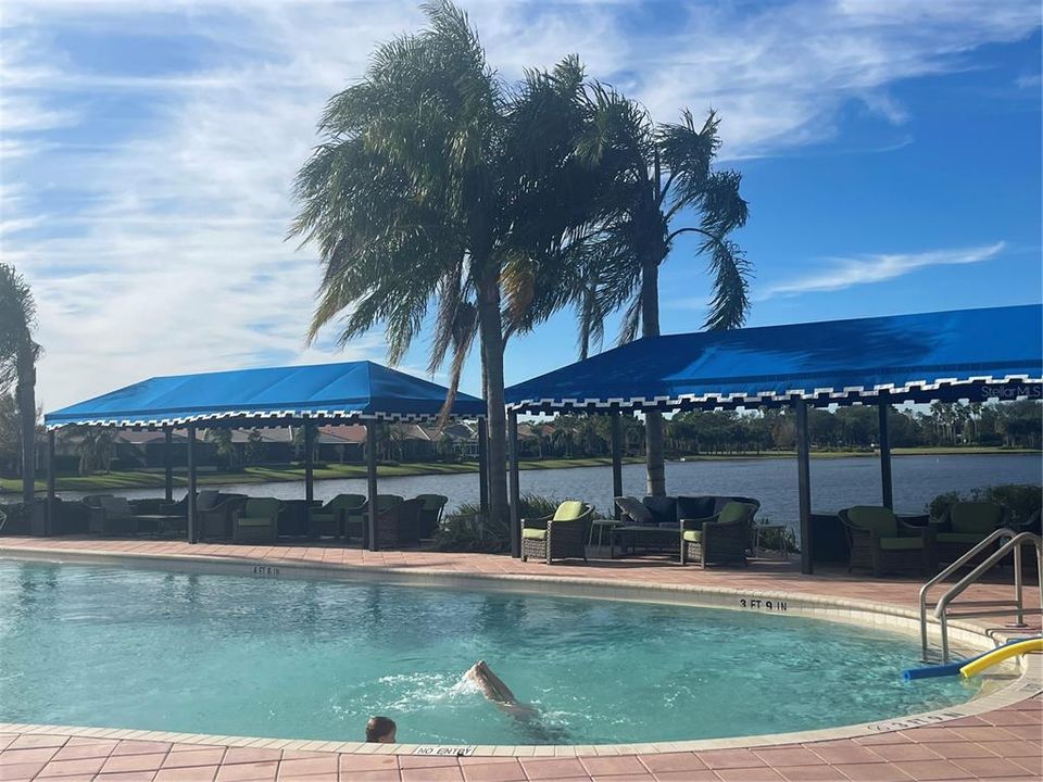 Cabanas overlooking pool and lake