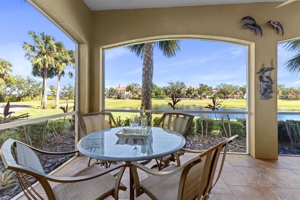 Large, covered lanai overlooking water and the 8th Green