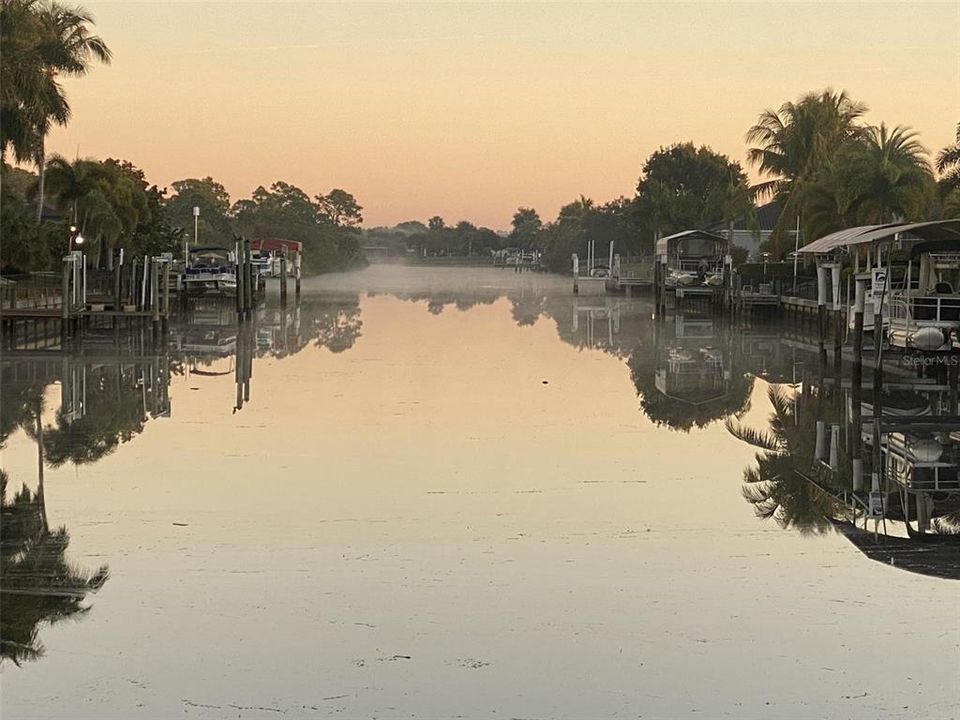 Foggy morning long canal view