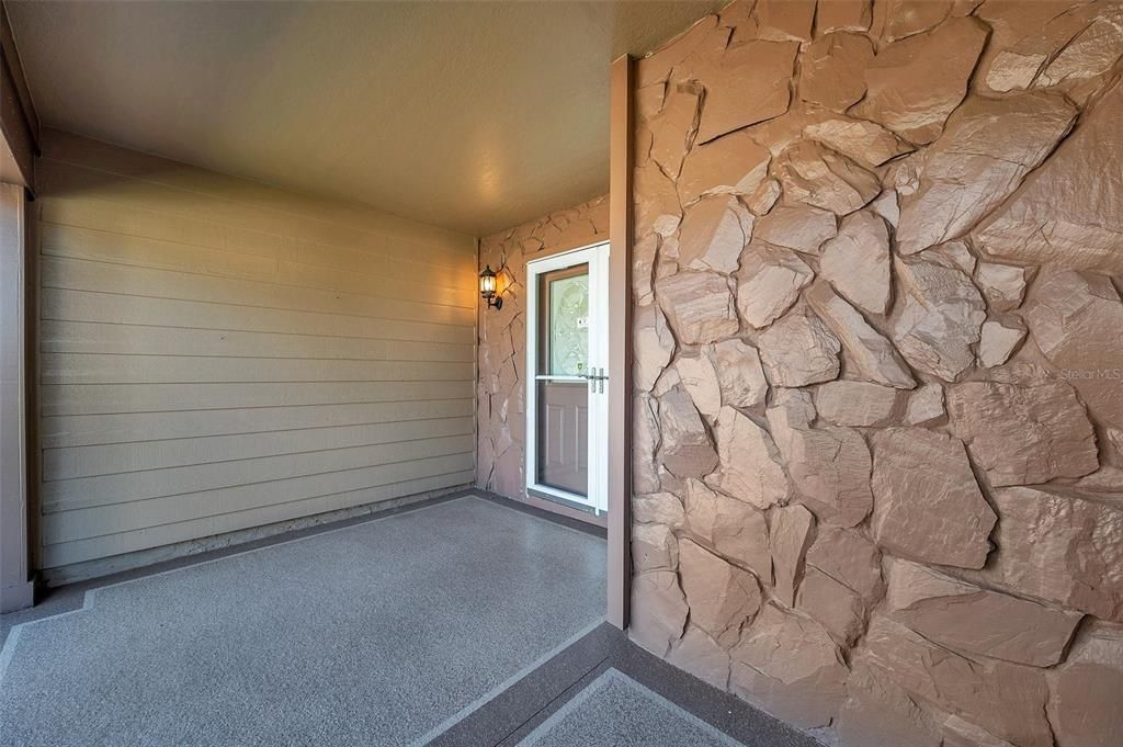 View from side of porch toward the front door