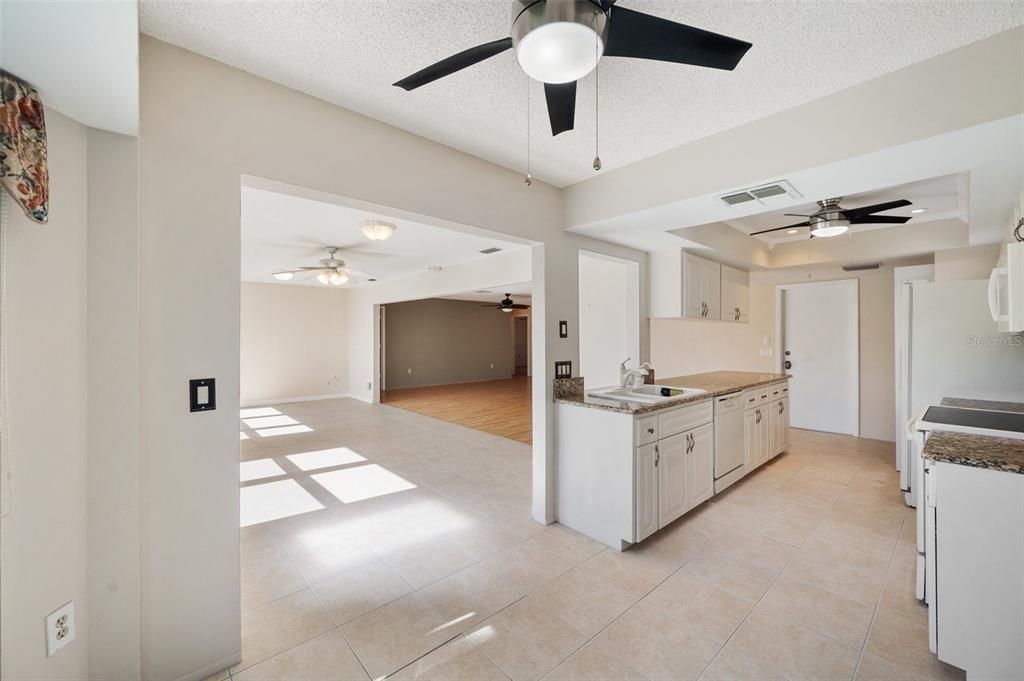 View of family room, living room and kitchen from the breakfast nook