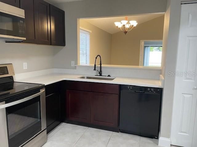 Kitchen with View in to Dining Room