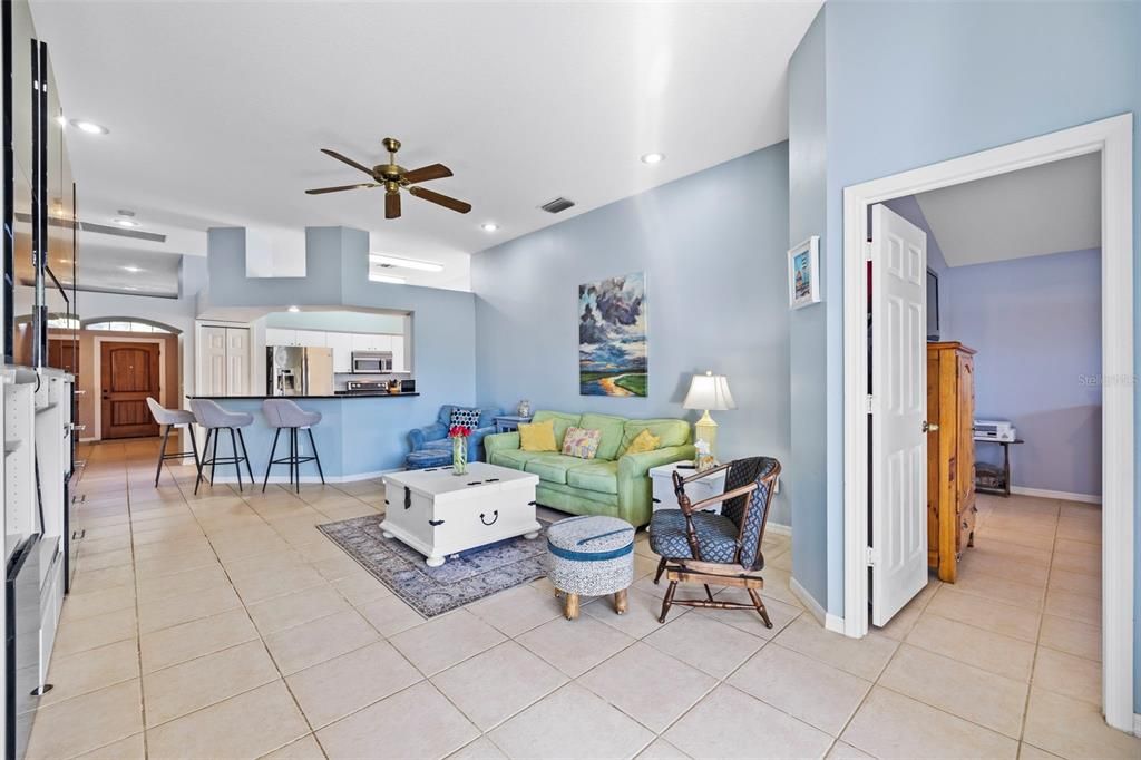 Family room with view into Primary bedroom