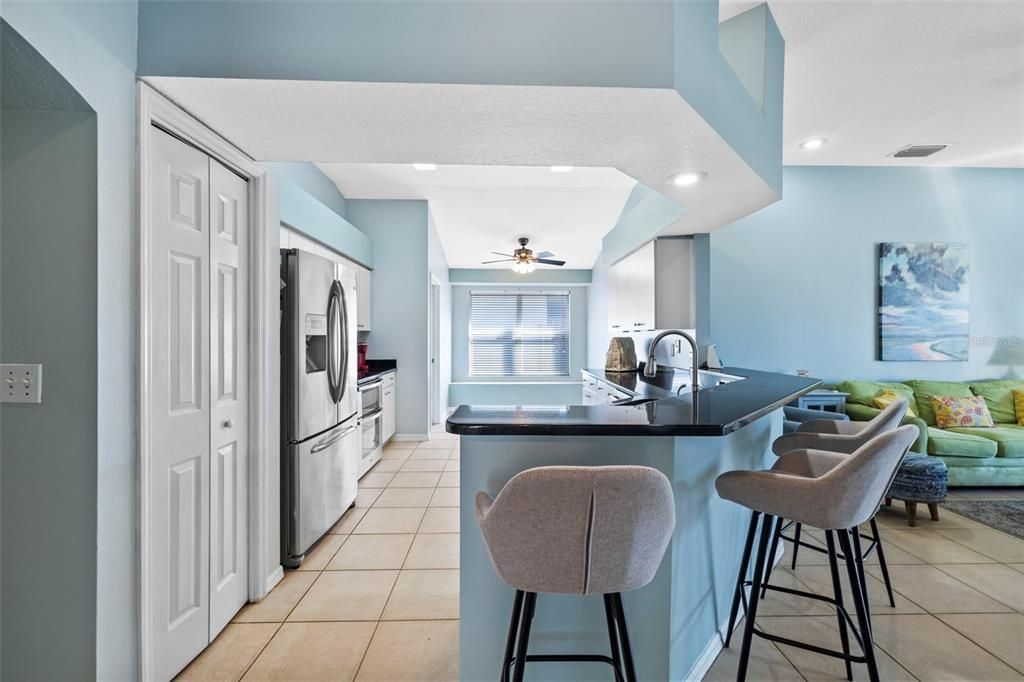 Kitchen with view into family room