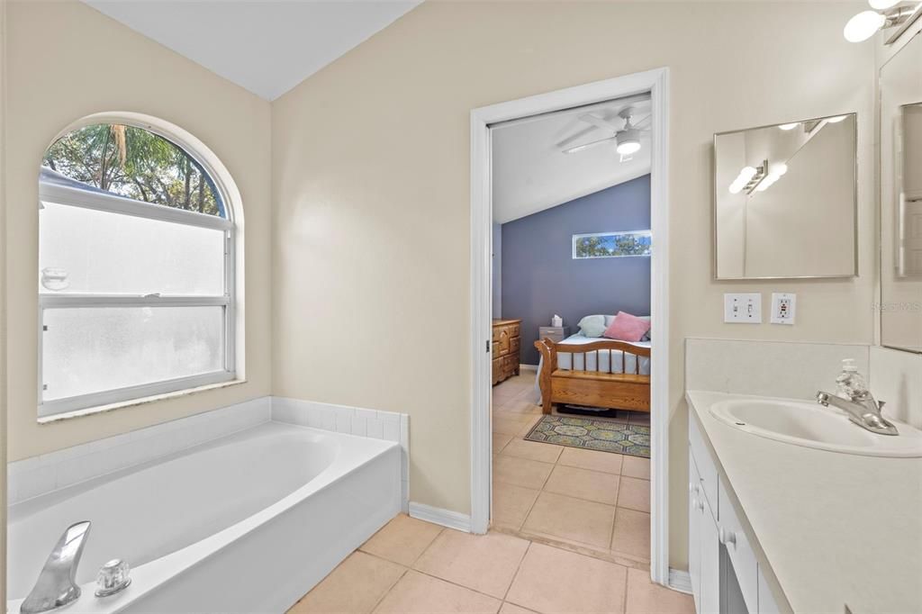 Primary ensuite bathroom with garden tub