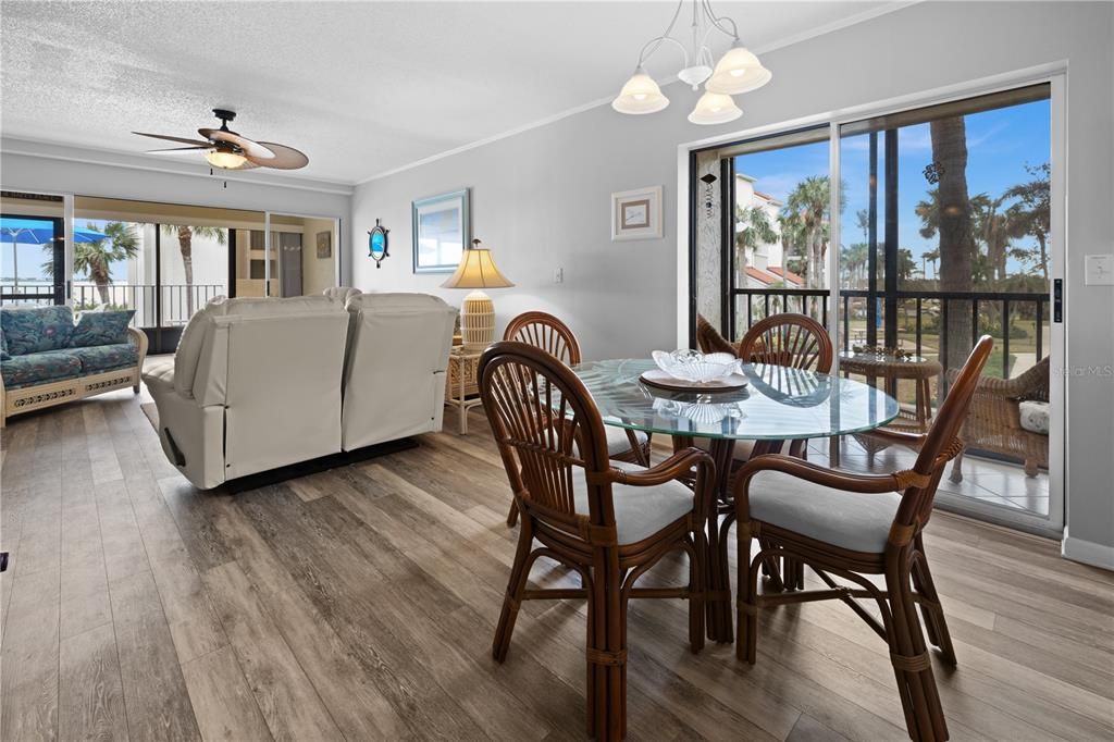 Dining Room with Side Balcony in background.