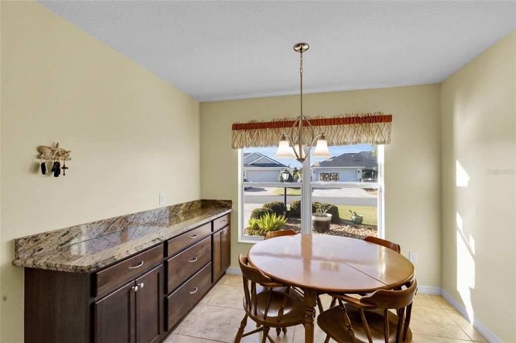 Built in cabinetry and eating space in kitchen