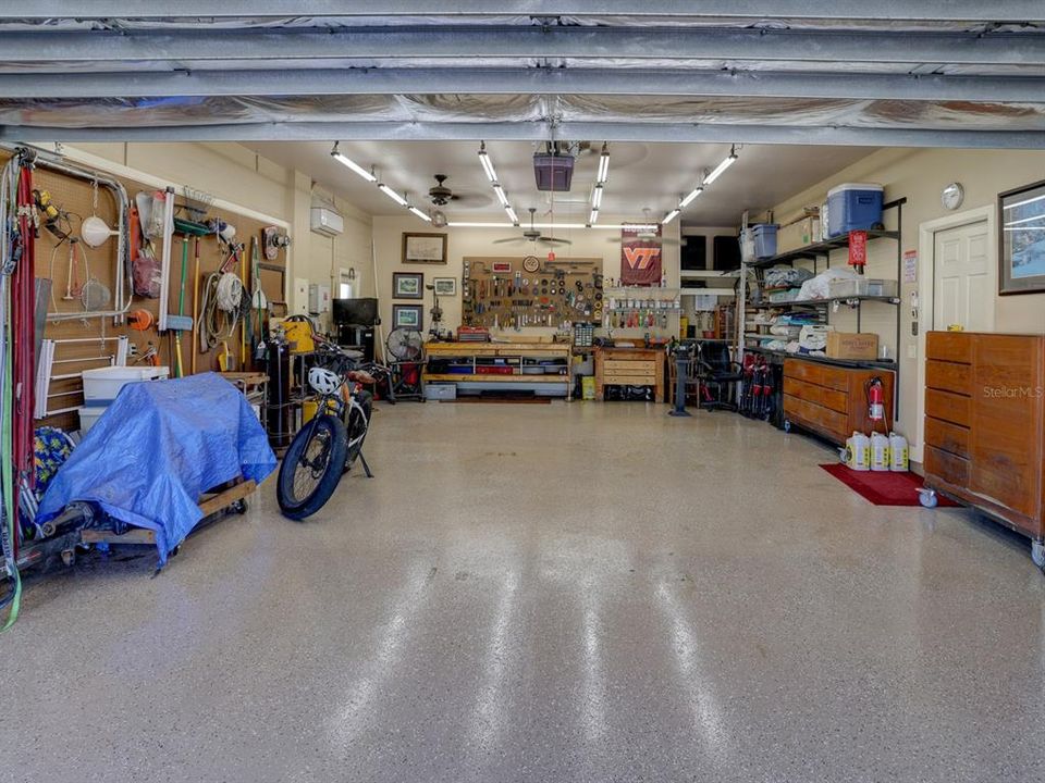 Tandem 2 x 2 Garage with epoxy floors. Heated and cooled separate from the home.