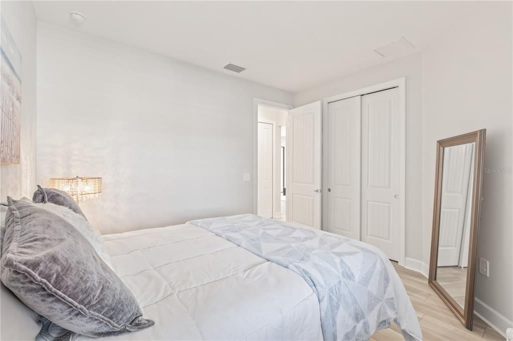 The bedroom includes a built-in closet.