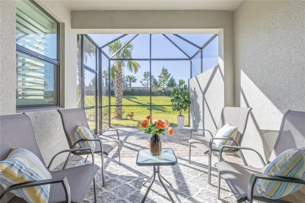 Extended screened-in paver patio