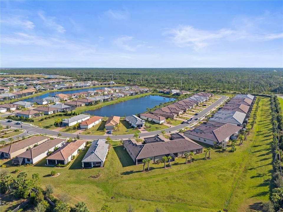 Aerial of the surrounding streets and community.