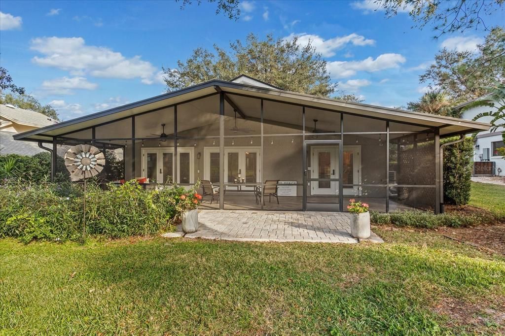 With French doors opening to all main living areas