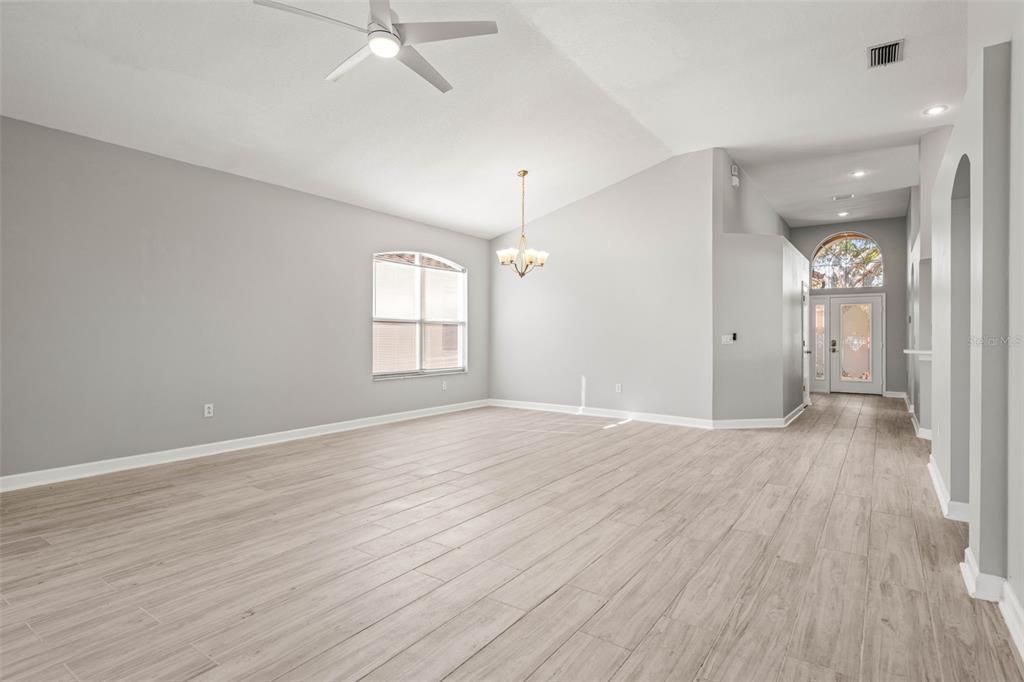 Living/dining combo with view towards foyer