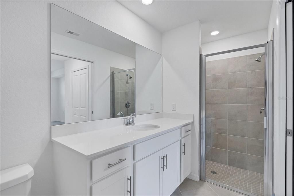 Bathroom with easy access standup shower