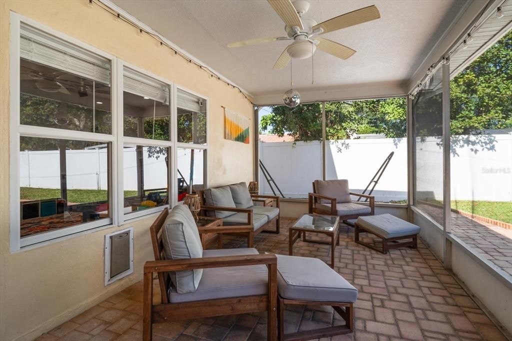 Screened porch area is perfect for relaxing