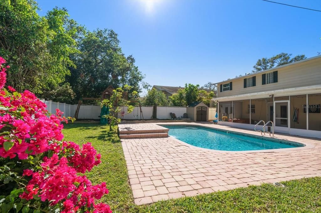 Back yard offers plenty of room to enjoy the pool and sunbathe in privacy!