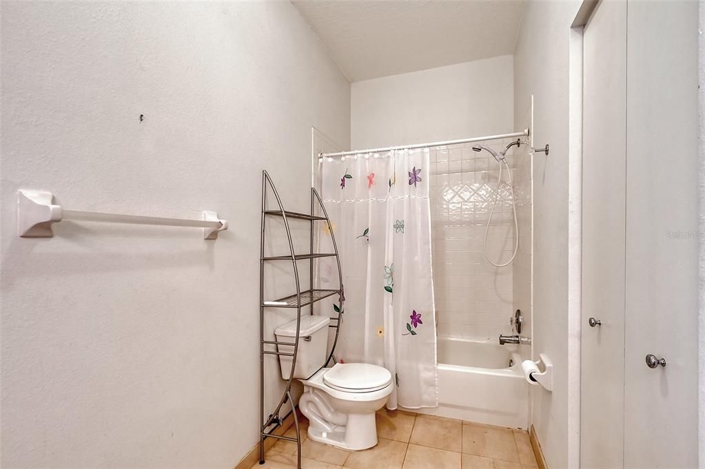 Bathroom 2 has a tub with shower, and a linen closet