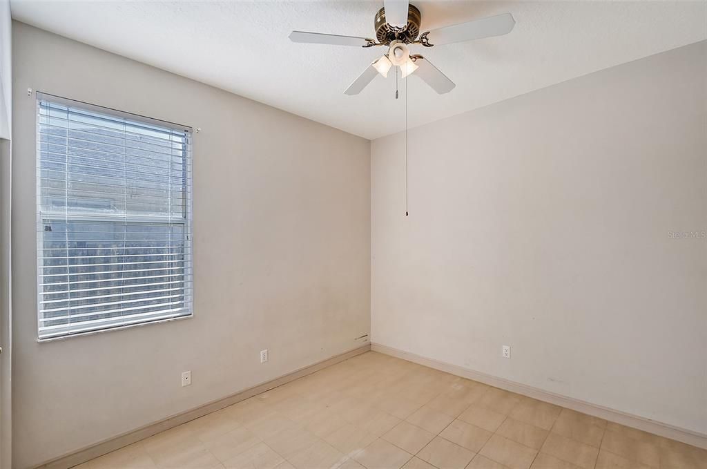 Bedroom 3 with ceiling fan