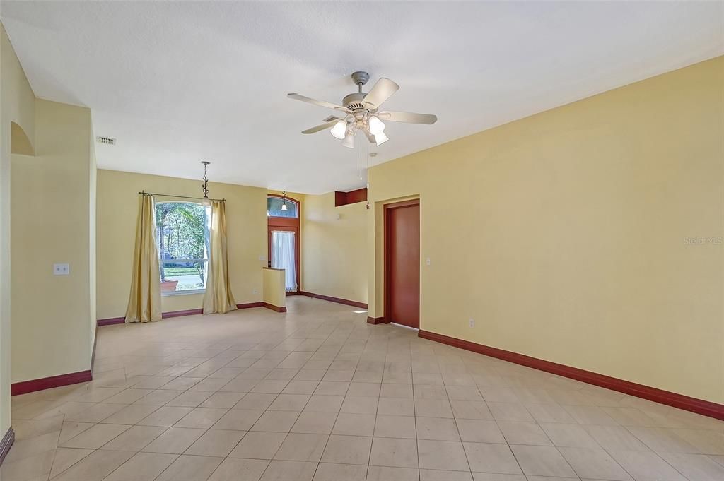 Front door enters to foyer and formal dining room and living room