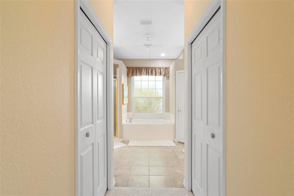 Dual Closets in Hall to Master Bath