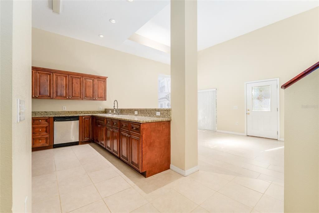 Granite counters in kitchen and a very bright living space!