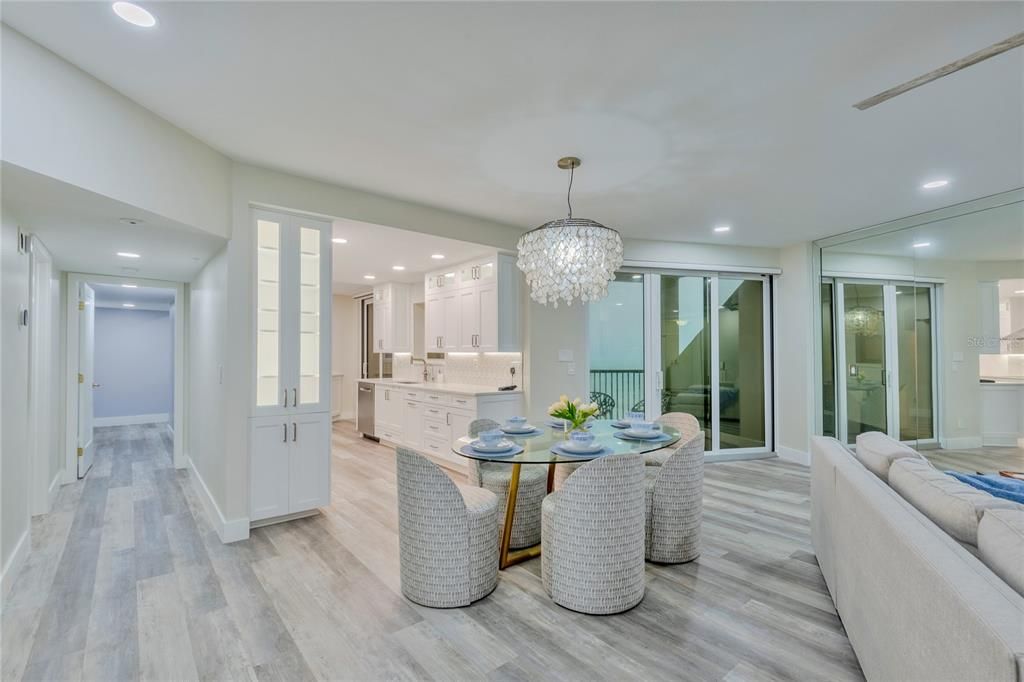 Notice the display cabinetry in the kitchen/dining area.