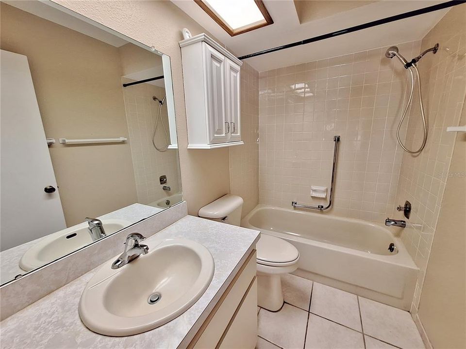 Hall bath with tub/shower combo~