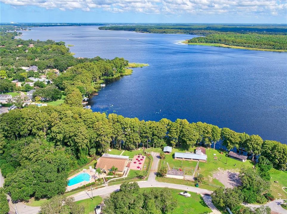 The Lake Tarpon Lodge offers a more rustic retreat & lakefront amenities with a 2nd heated pool, party & picnic facilities~