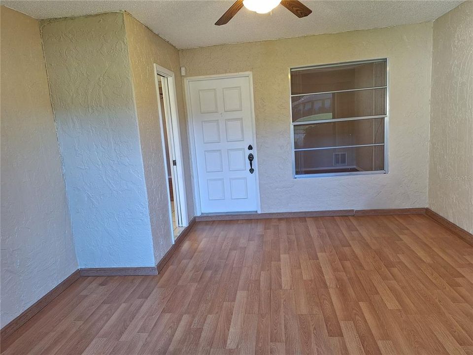 Room for comfortable seating with entry into main living & separate entry into the kitchen~