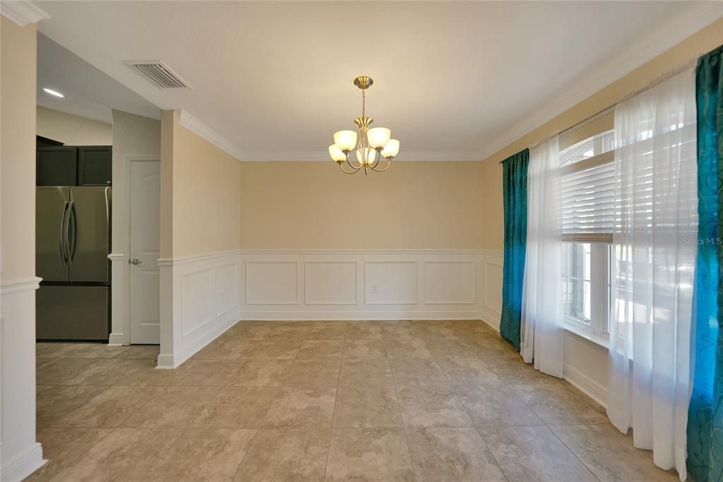 FORMAL DINING ROOM TO THE KITCHEN