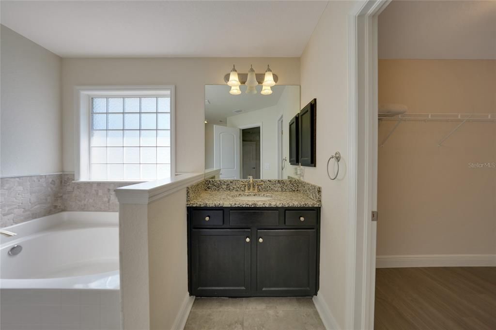 PRIMARY BATHROOM WITH SOAKING TUB