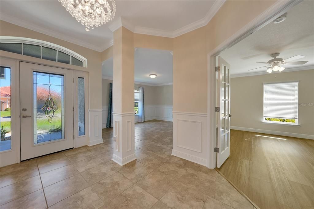 FOYER VIEW TO FORMAL LIVING ROOM/OFFICE DEN