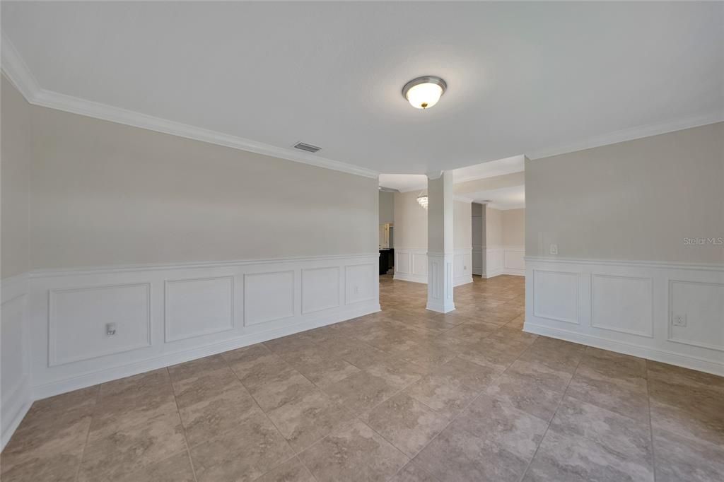 FORMAL LIVING ROOM VIEW TO FOYER