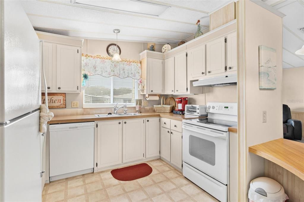 Front Kitchen which is light and bright. All appliances with closet pantry