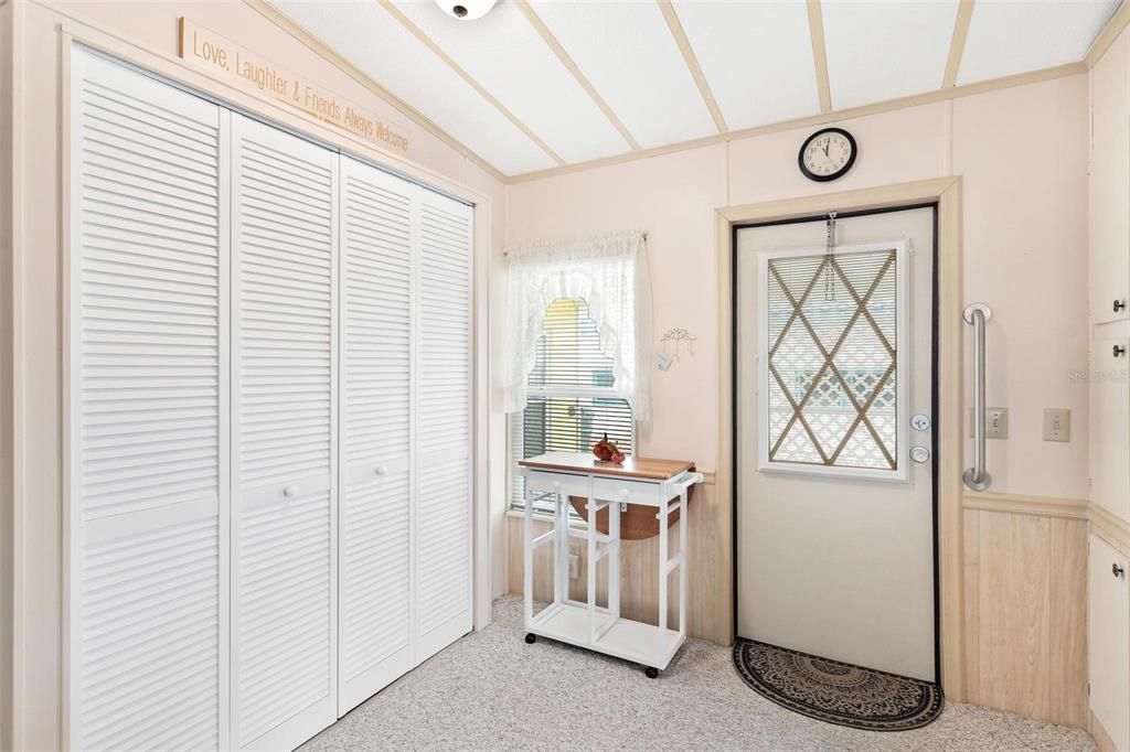 Entrance into home, Utility area on left