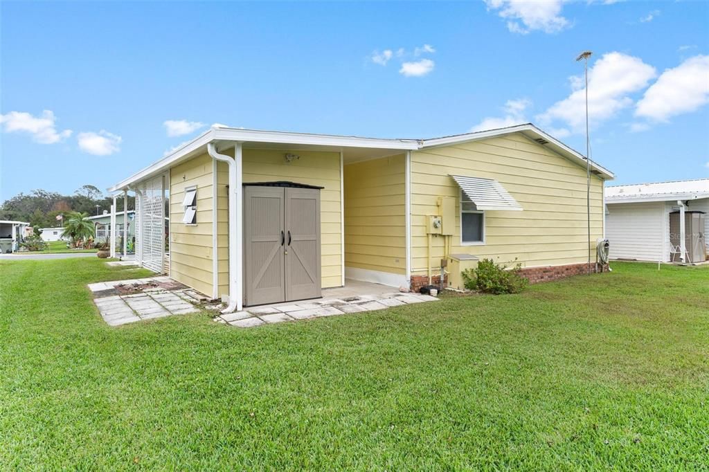 Back of Property with extra storage shed