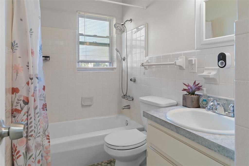 This Bathroom has a Tub/Shower combo