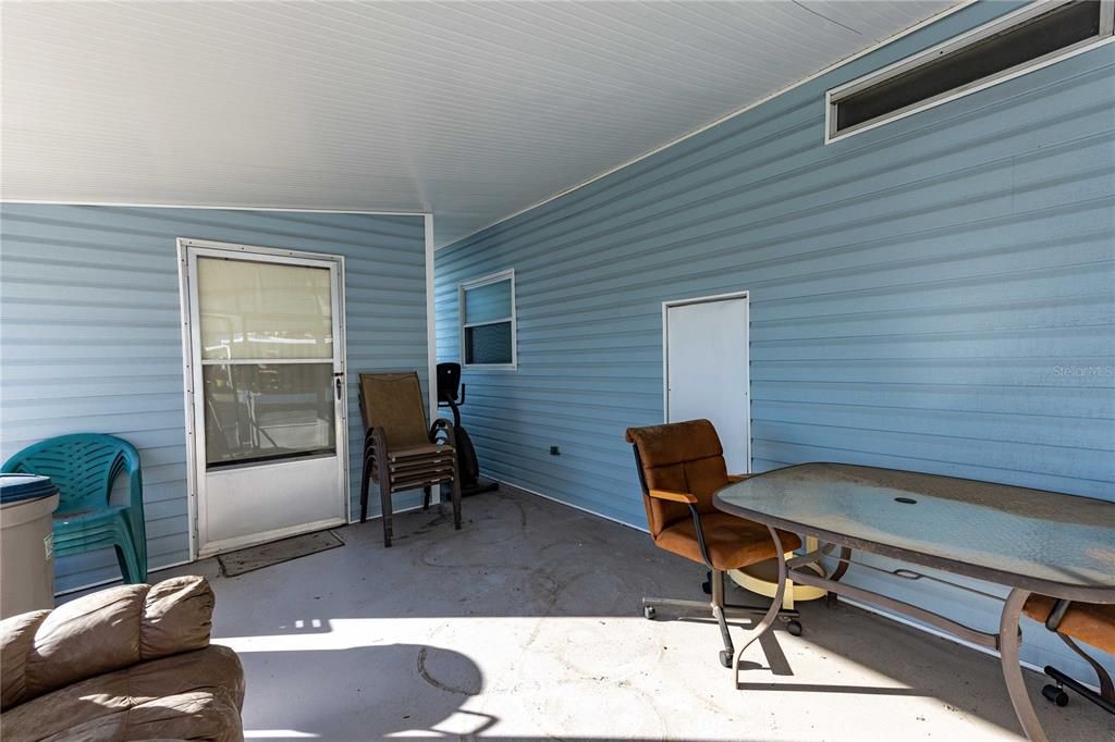 Carport screen room.