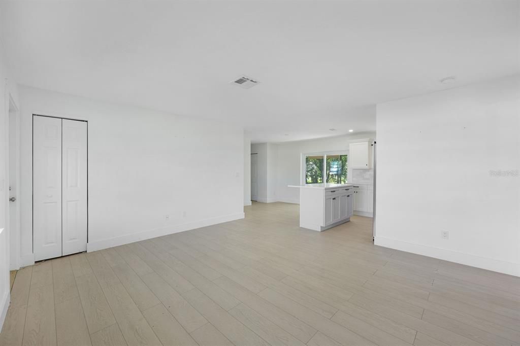 Empty room featuring light wood-type flooring