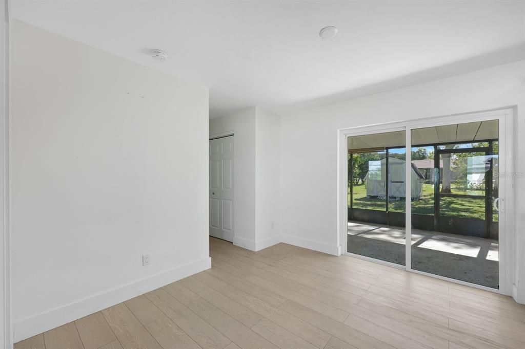 Unfurnished room with light hardwood / wood-style flooring