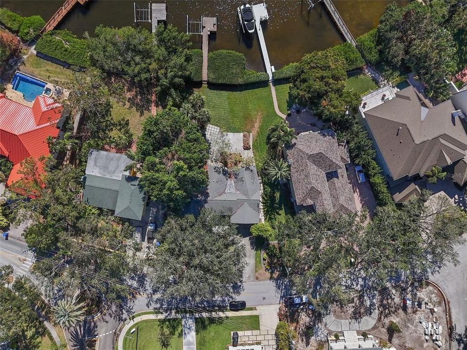 Overhead view of home, backyard, dock, and bay