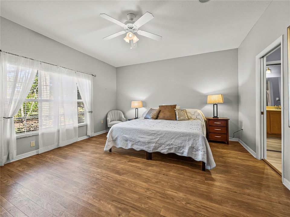 Primary bedroom with large window