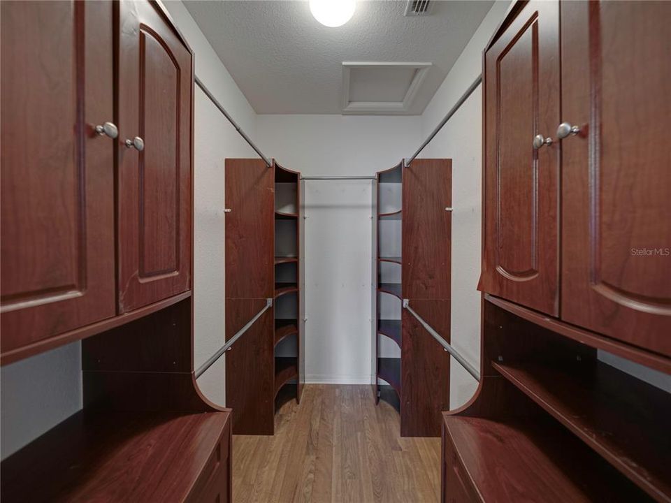 Walk in closet with organizers for storage