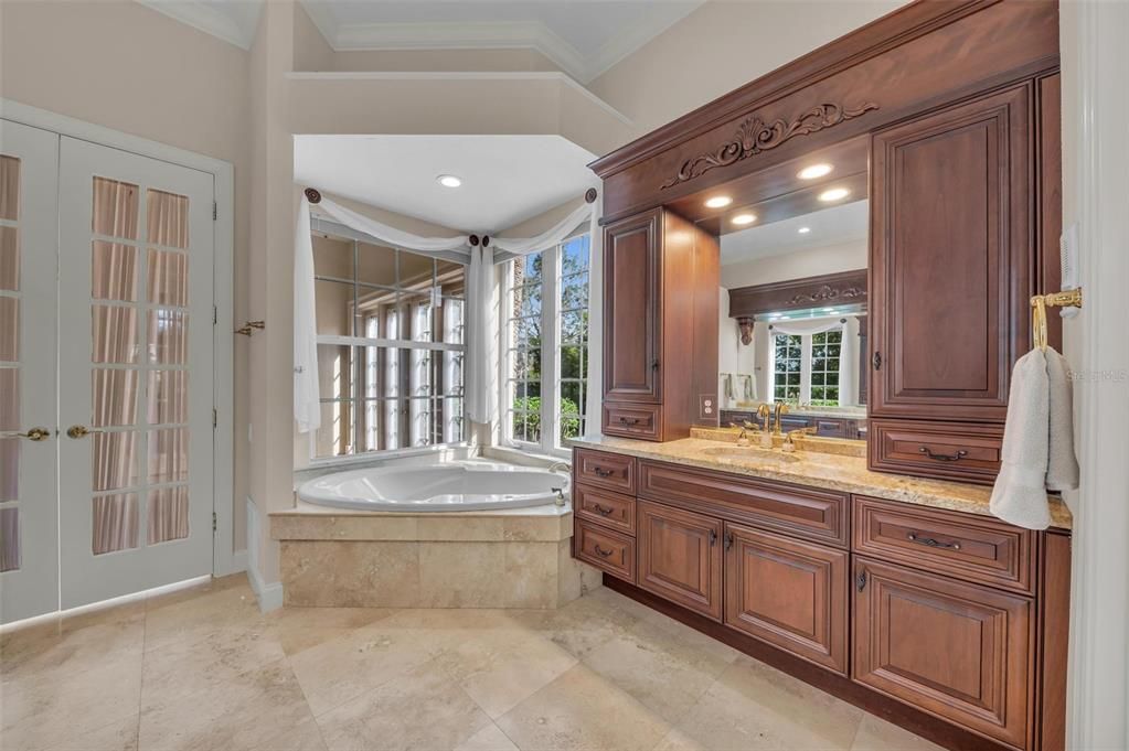 Master Suite Travertine walk in Shower built in Bench