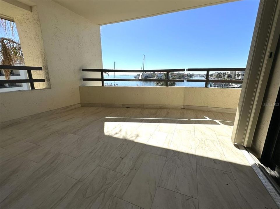 Balcony Space with waterfront view - entry from Living Room and Primary Bedroom