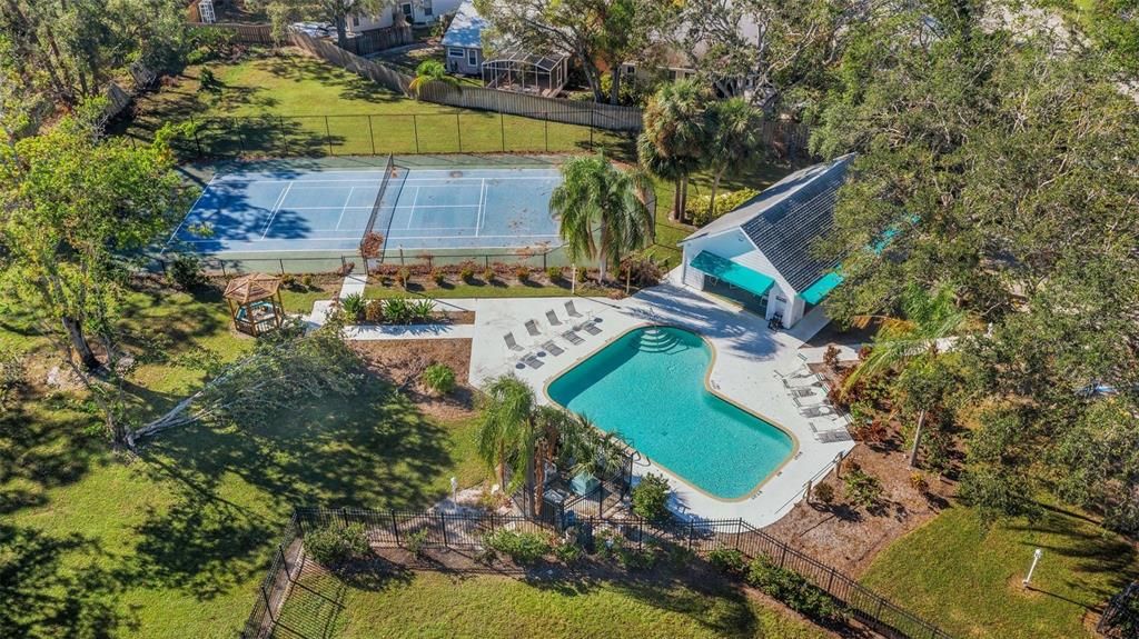 Heated community pool, tennis courts, and newly renovated clubhouse. Low HOA fee also includes cable.